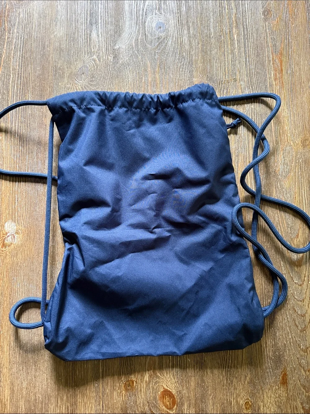 Nike Navy Drawstring Backpack with White Swoosh Logo